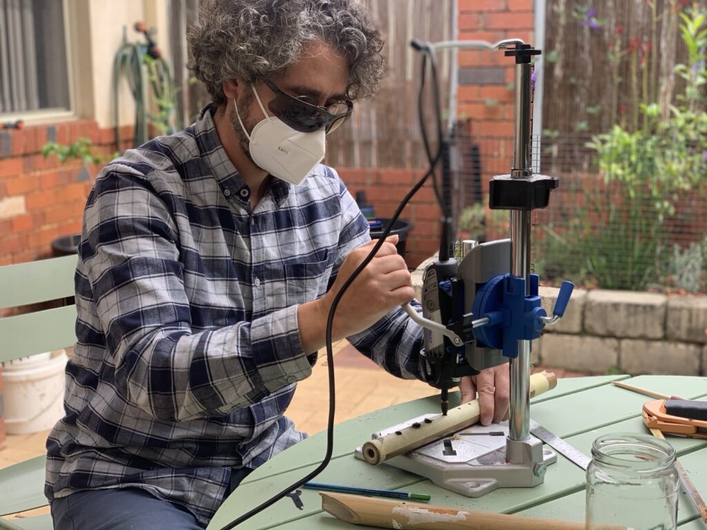 Pedro Alvarez making a Quena (Andean bamboo flute)